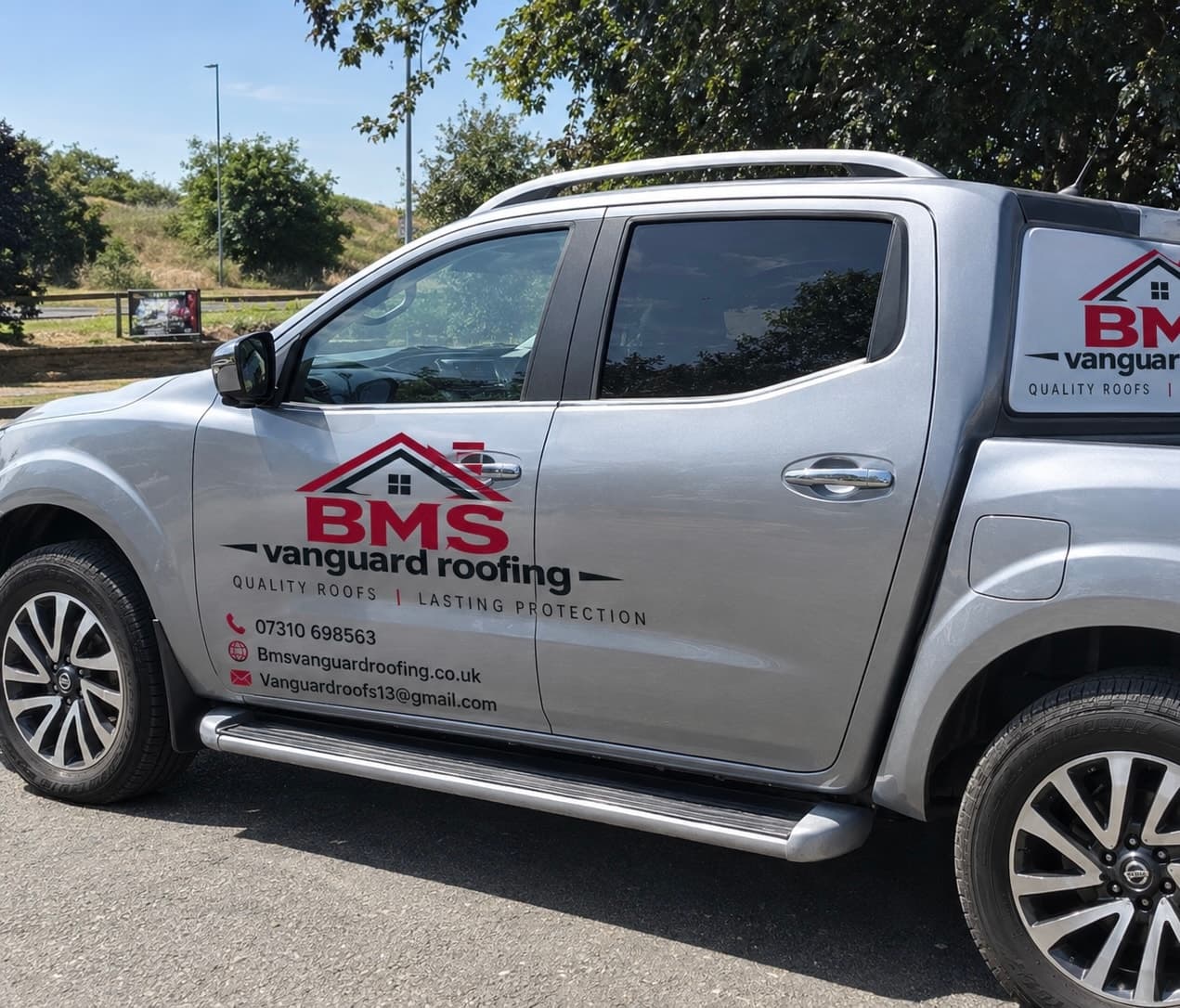 BMS Vanguard Roofing branded pickup truck