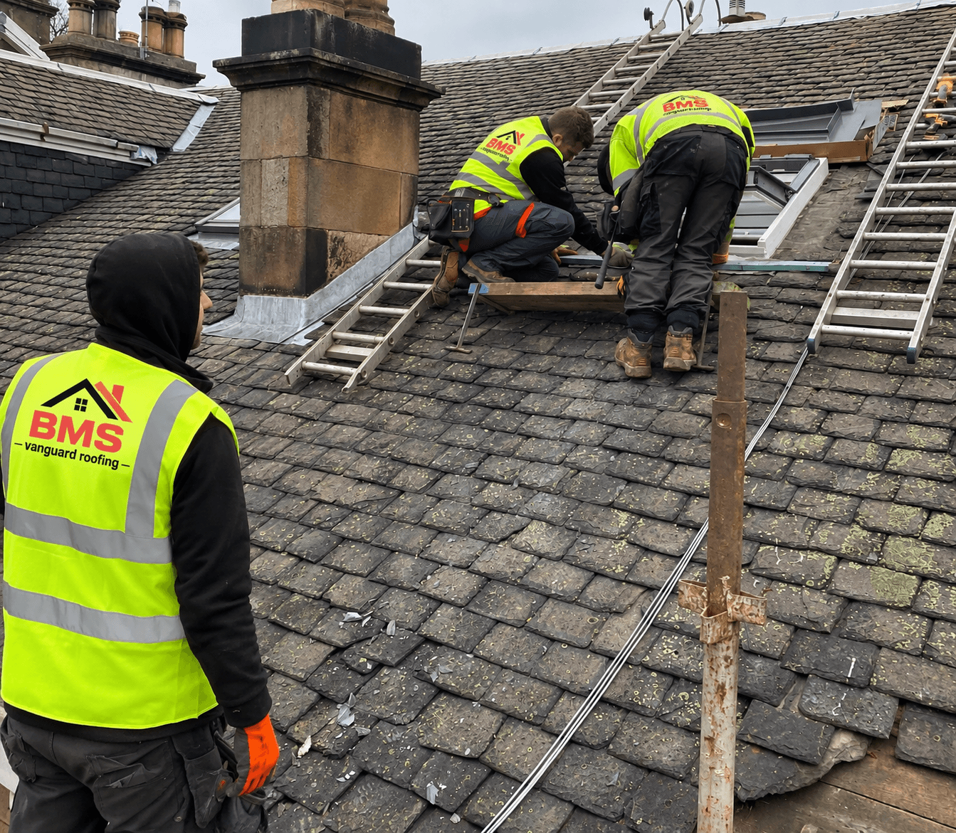 BMS Vanguard roofing team working on a slate roof