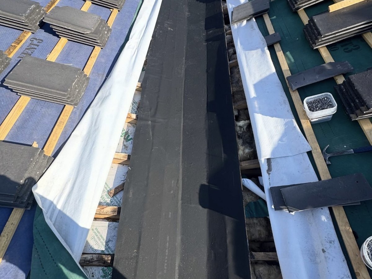 Roof valley being re-laid by BMS Vanguard Roofing